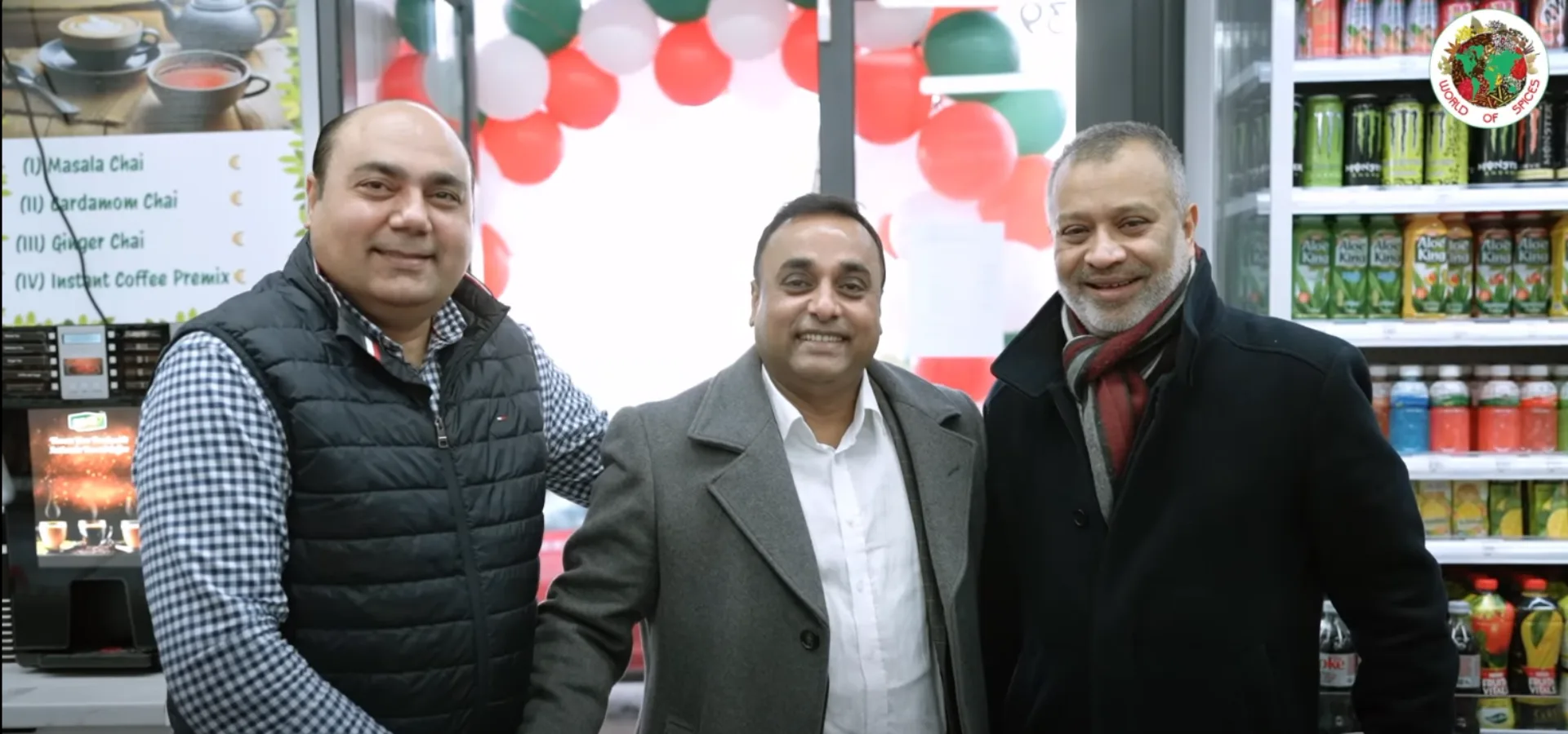Three of the World of Spices team inside the shop