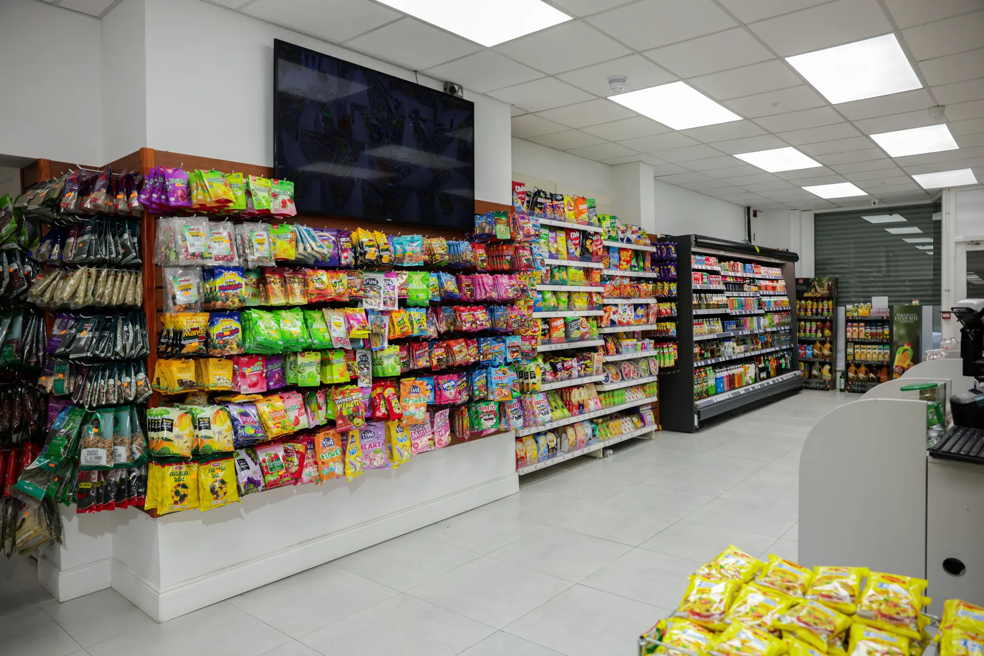 Shelves of crisps, namkeen and snacks