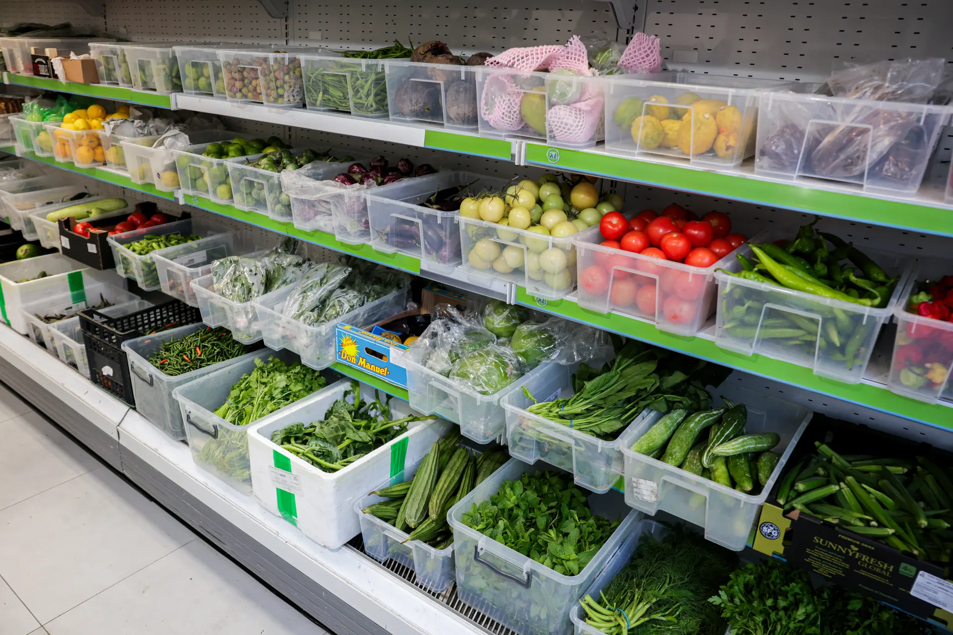 The long fresh vegetable shelf at World of Spices